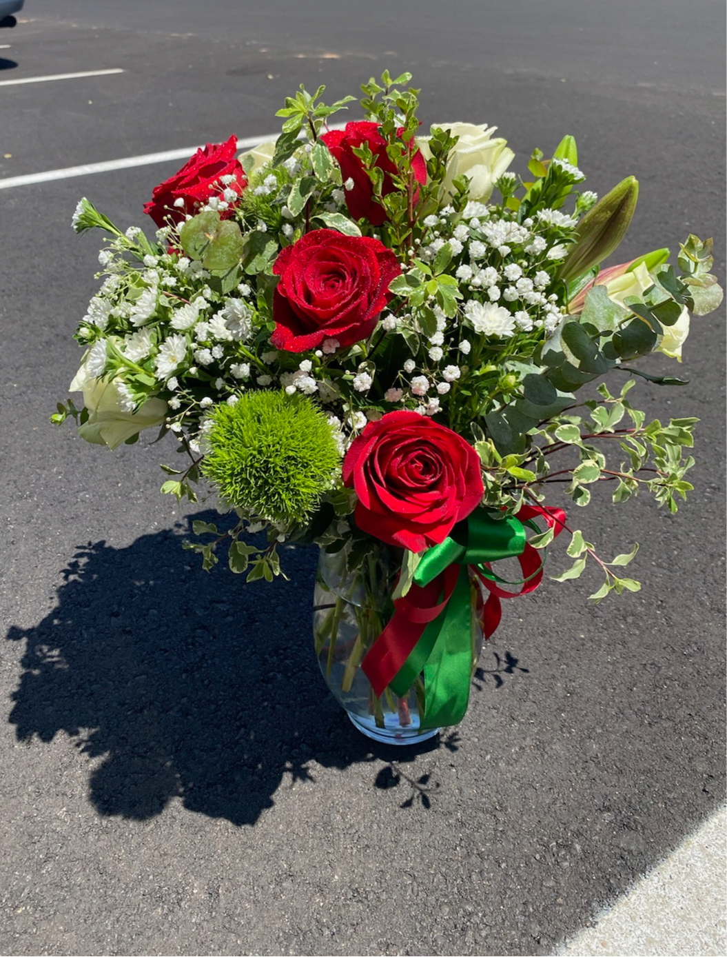 Long stem red and white roses bouquet with baby breath flowers