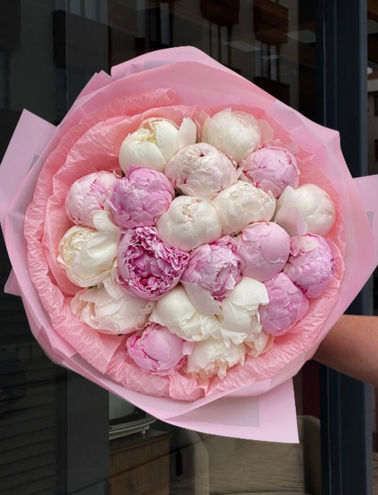 Experience the beauty of premium peonies with our Bountiful Peony Bouquet. Handcrafted by Phoenix florists and available for same-day delivery. Shop luxury flowers today.