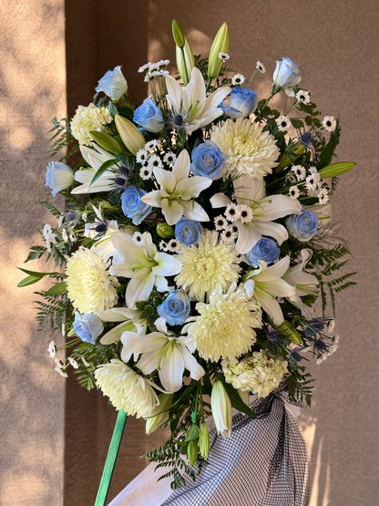 Blue & White Funeral Standing Spray
