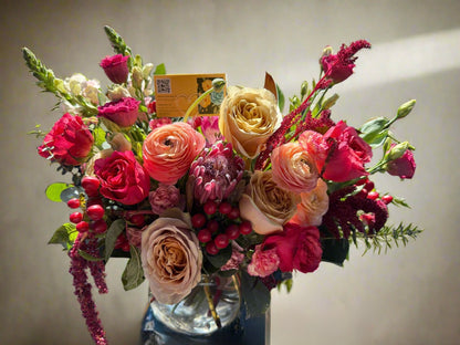 Gorgeous luxury burgundy flower arrangement with peonies, proteas, available for same day flower delivery in Gilbert, Queen Creek.