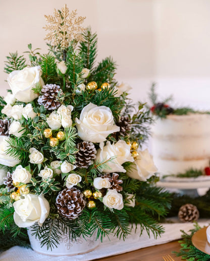 Snowy Oasis Tree with white roses and holiday greens arranged, available for same day flowers delivery in Gilbert, Arizona,