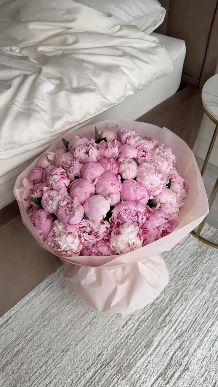 Experience the beauty of premium peonies with our Bountiful Peony Bouquet. Handcrafted by Phoenix florists and available for same-day delivery. Shop luxury flowers today.