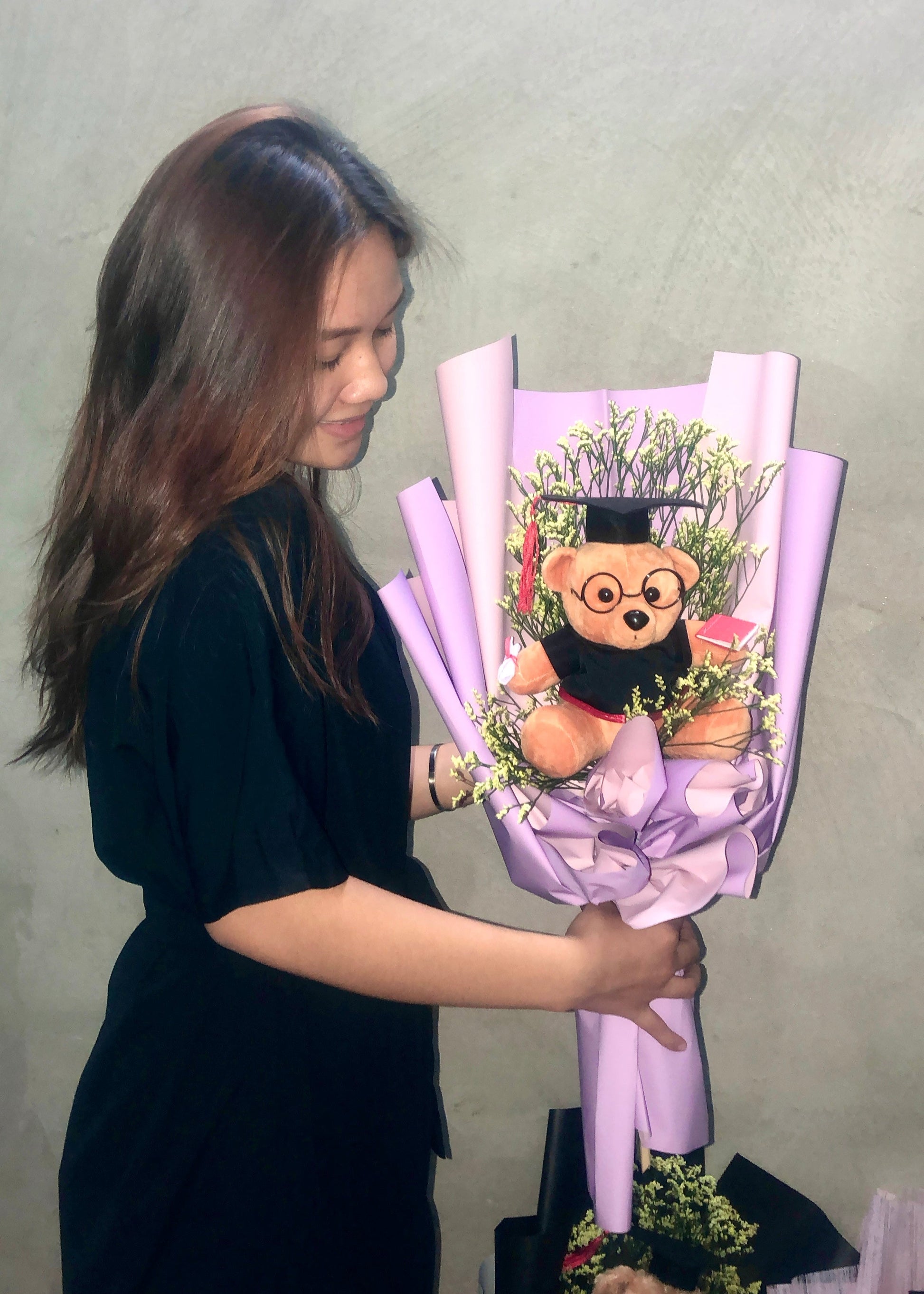 Graduation bouquet with statice, lumonium, and baby’s breath
